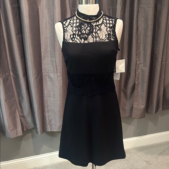 Jessica Simpson Dresses & Skirts - Jessica Simpson Little Black Lace Dress with gold neckline NEW